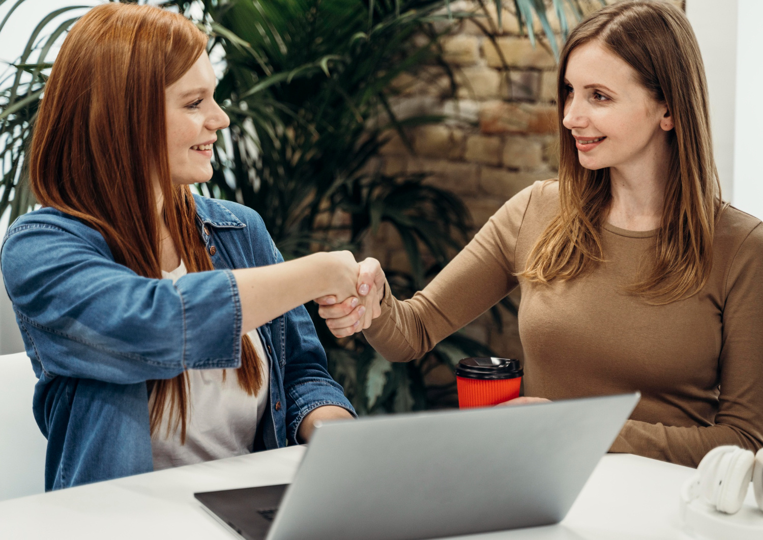 two-people-shaking-hands